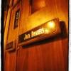 The Entrance door - massive wood Carmela JAzz & Wine Bar